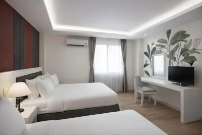 Habitación triple — Asian Ruby Center Point Hotel - Near Nguyen Hue Street